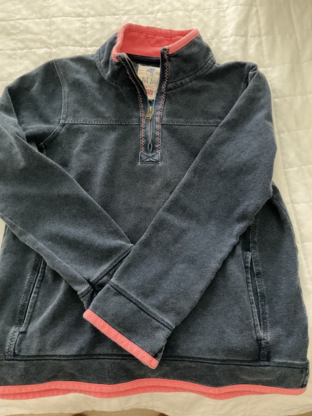Fat face pull over. Photo color inaccurate….more like navy and coral/pink.